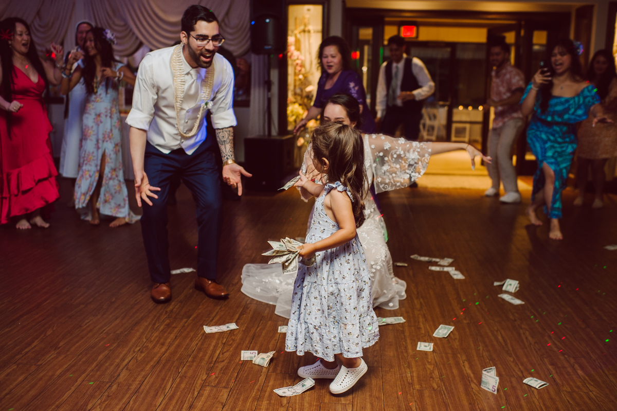 These two dancers, passionate lovers got married on a hot humid day at Auletto Caterers in Deptford NJ. Even though it was hot & humid Nina and Hector were all smiles as well as their family during the family portrait time. Wedding couple's and families that listens to you and does everything you ask them to even though the weather and environment can be tough are the BEST kind of clients! Nina and Hector were that best ideal clients, they from day one left all control regarding photo to me, did not question or have concerns. Knowing that you have this full trust and control on the wedding day makes you want to give your 100% and more. Nina and Hector are one of my top ideal clients and their wedding day photos are living proof of it. Nina and Hector's wedding day was combined of casual, mess, chaos, laughters, chill, emotional and passionate love for dancing. This was my first time at Auletto Caterers and in this part of NJ and this wedding venue in Deptford NJ was a pleasant surprise. It was full of secret locations for photos, garden, little pond where I played around with reflections, peacocks, waterfall and lavender field! Plus kind people to work with. Nina and Hector's July wedding at Auletto Caterers NJ captured by Karis from Hey Karis NY, NJ, Brooklyn, Hudson Valley and Catskills Wedding and Elopement Photographer.